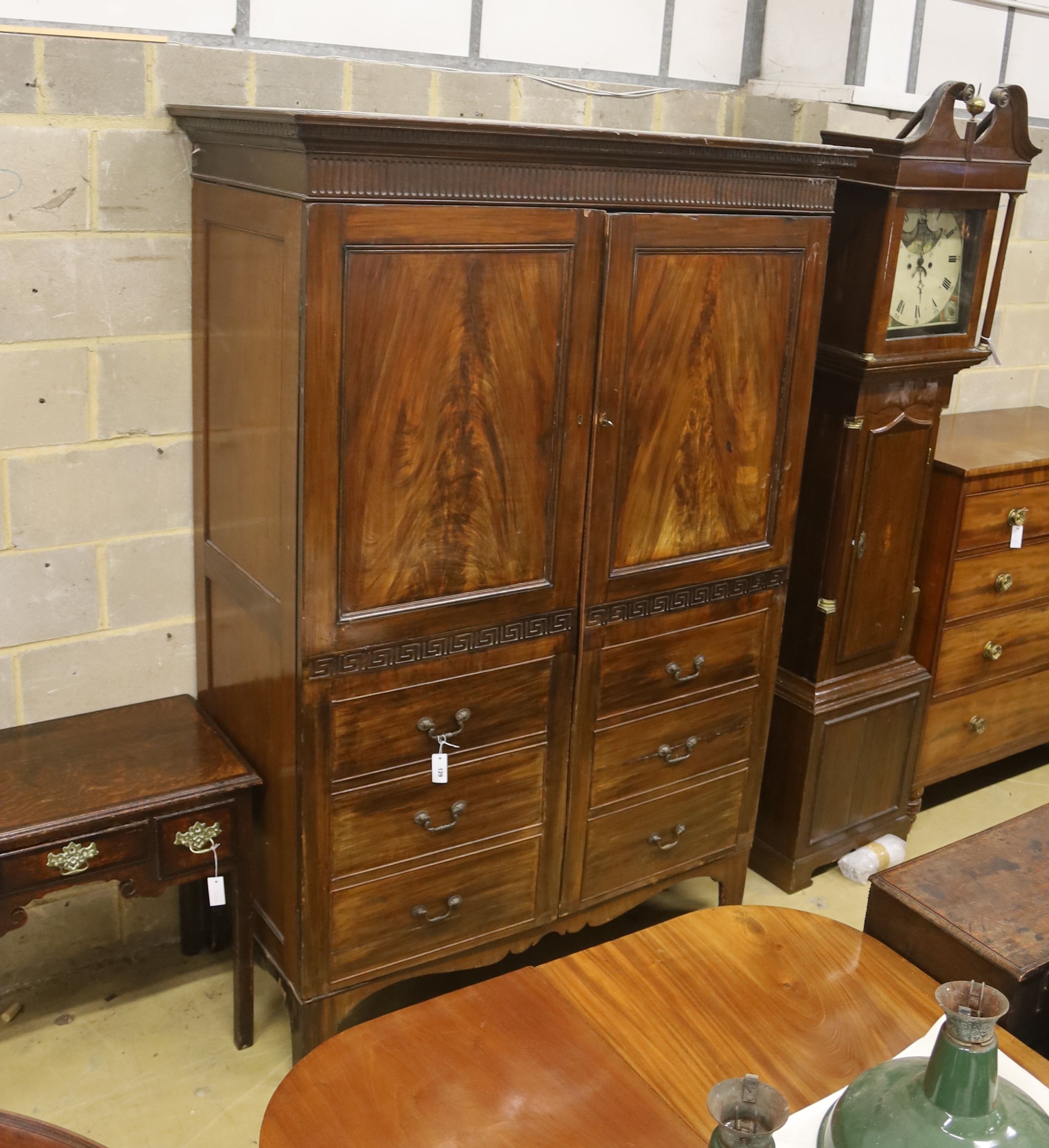 A George III style mahogany hanging cupboard, width 142cm, depth 65cm, height 209cm